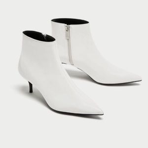 White faux patent ankle booties